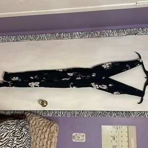 Women’s medium jumpsuit. Navy with floral print. New with tags still attached.